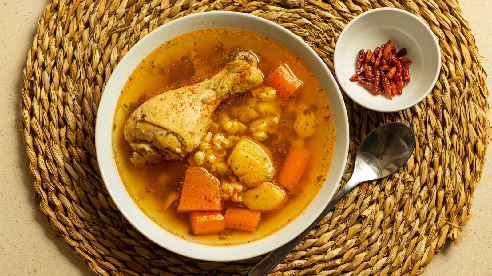 Delicious Spanish chicken stew with vegetables in a rustic setting, perfect for cozy meals.