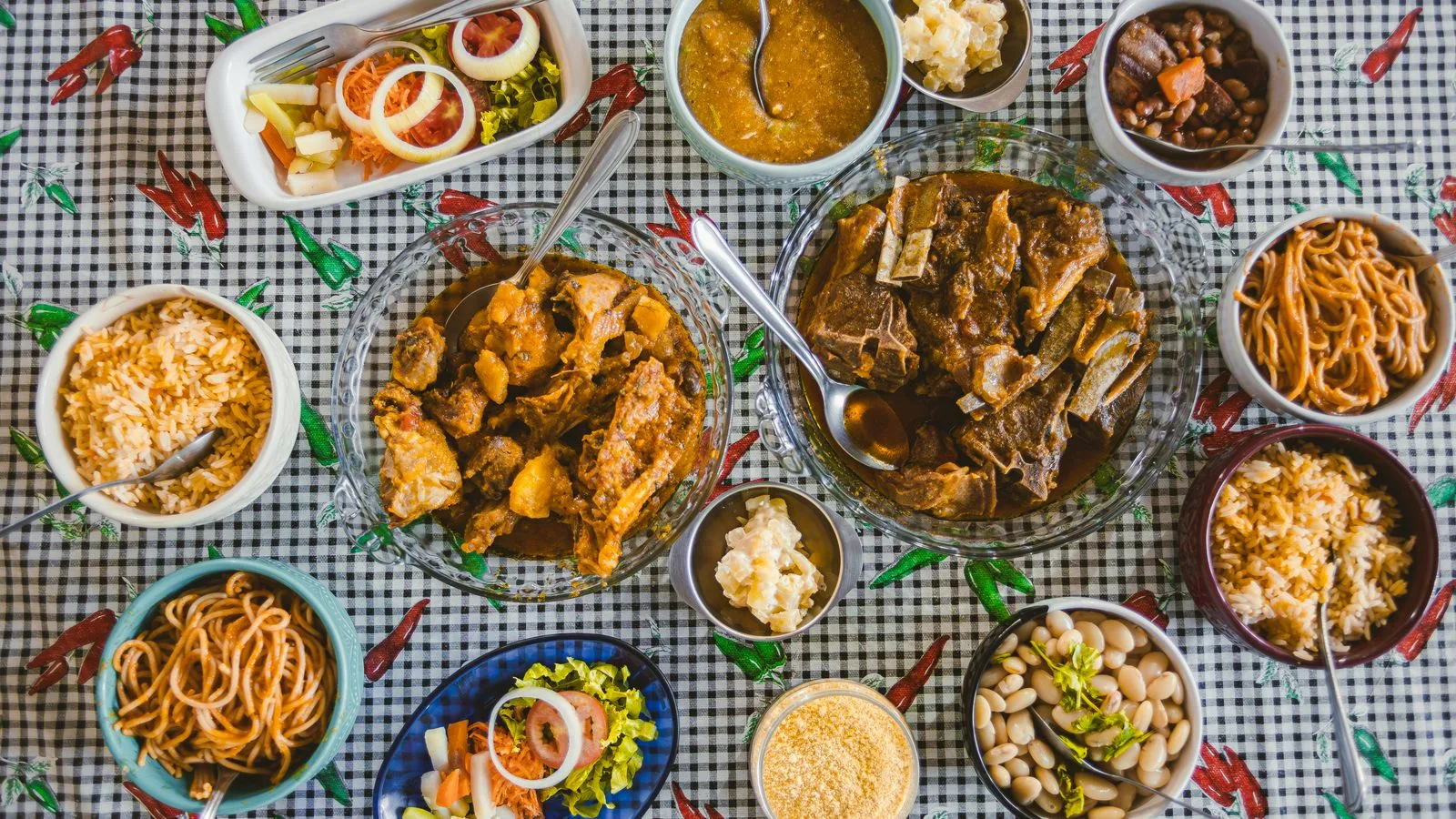 A diverse Brazilian feast displayed in a traditional setting, showcasing local cuisine varieties.