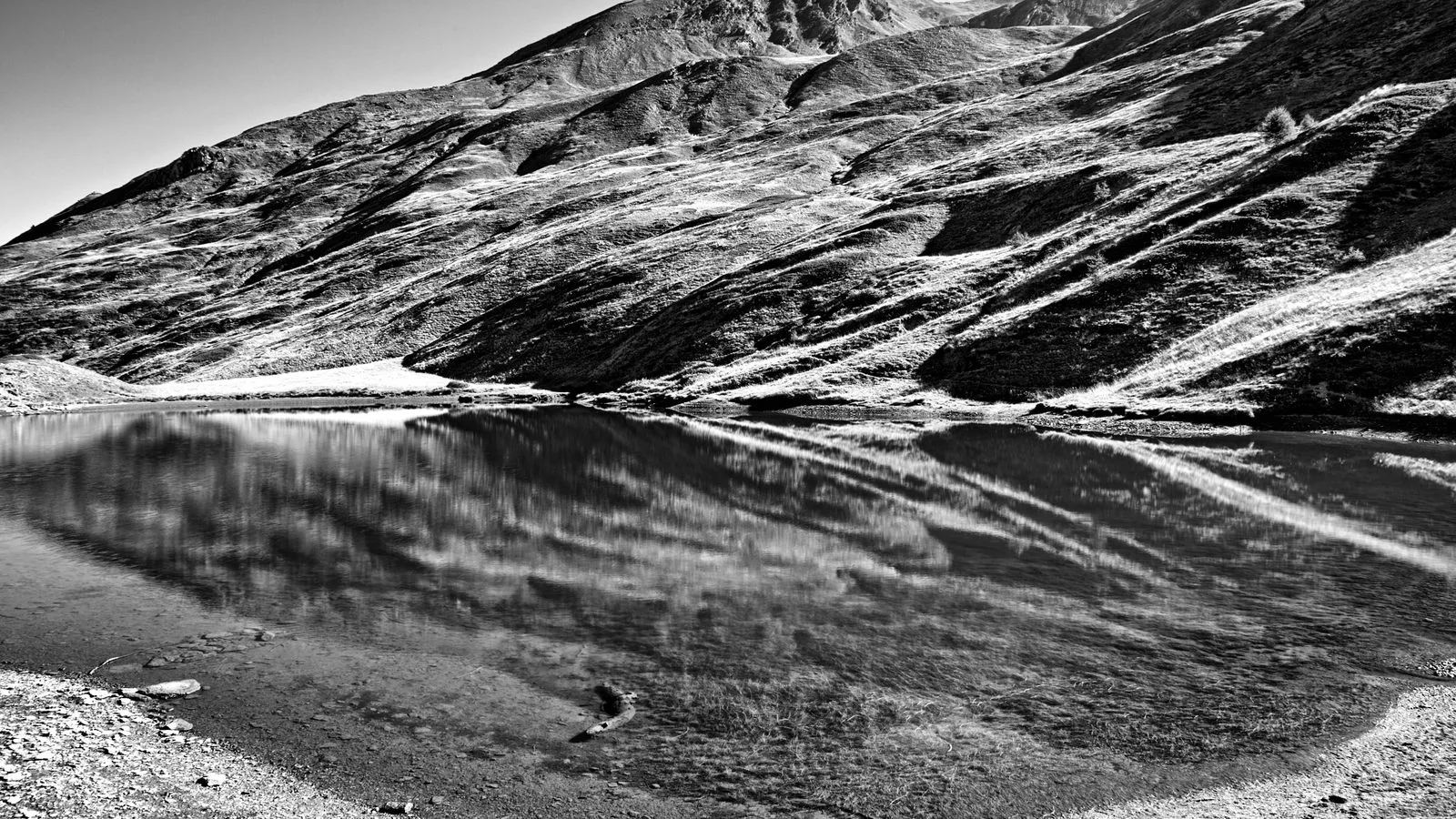 Stunning black and white image of mountain reflections in Abriès-Ristolas, Provence.
