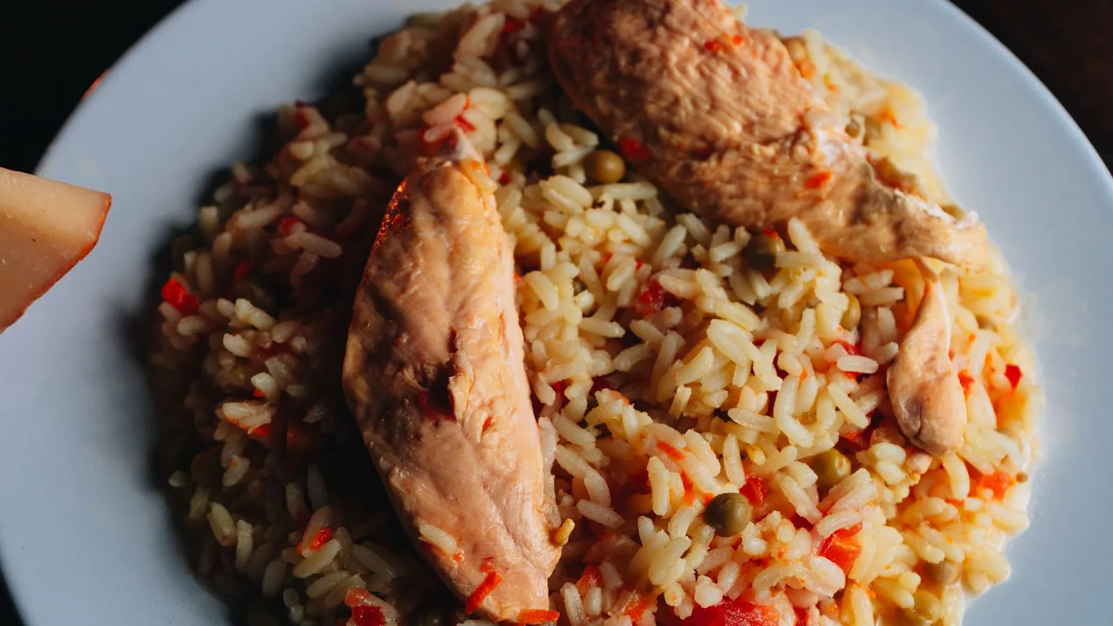 Close-up of a savory chicken and rice dish, perfect for dinner or lunch.