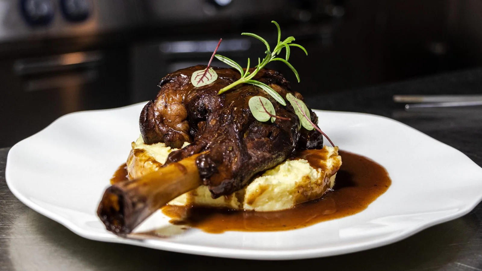 Delicious roasted lamb shanks served on creamy mashed potatoes with rich gravy.